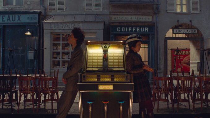 Timothée Chalamet and Lyna Khoudri in the film THE FRENCH DISPATCH. Photo Courtesy of Searchlight Pictures. © 2021 20th Century Studios.
